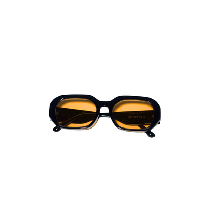 Sunglasses with black frame and yellow lenses DB Engraved on a white background